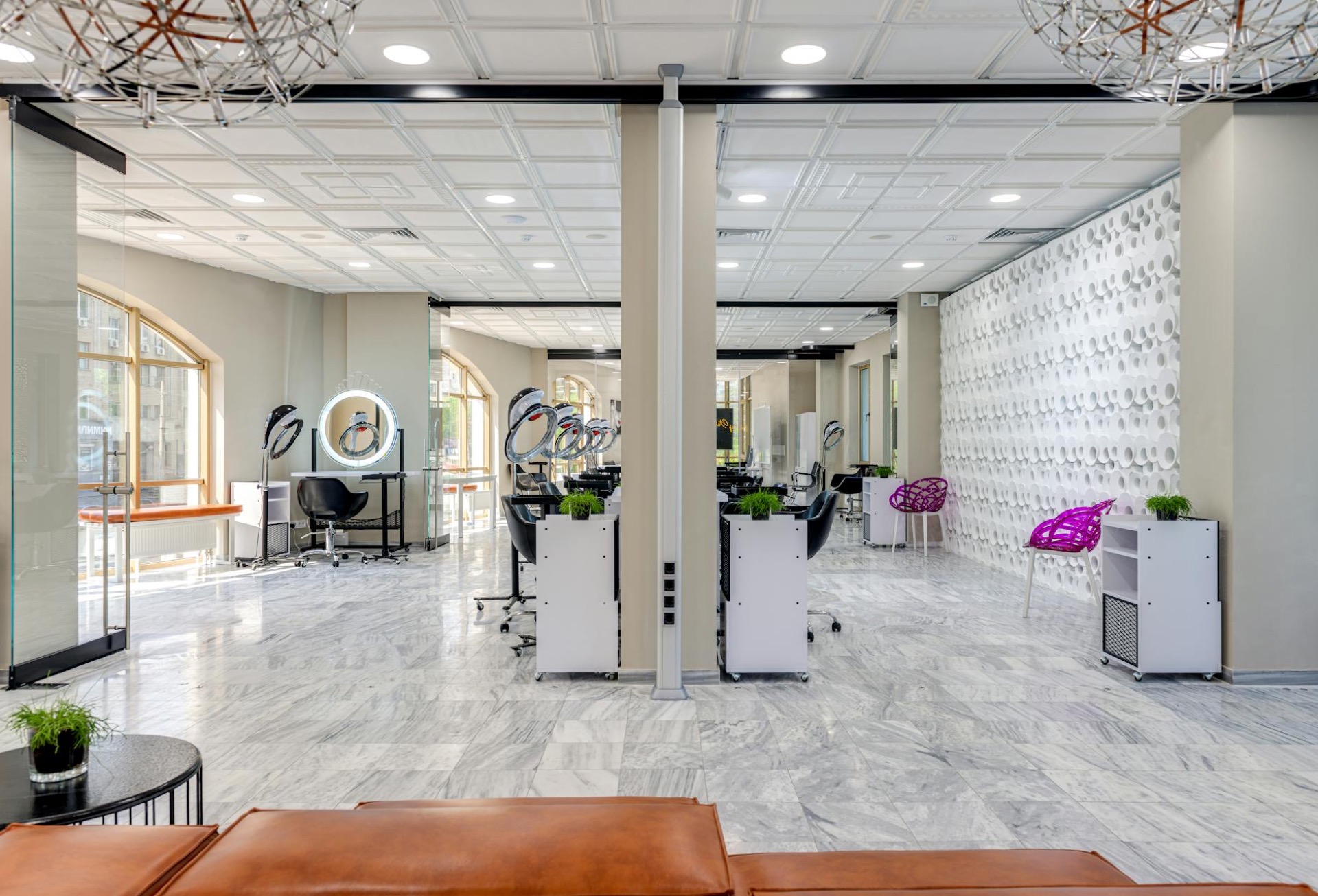 Modern beauty salon interior with warm lighting and elegant furnishings